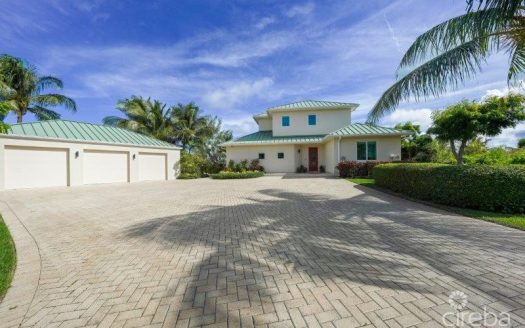 UNIQUE PATRICK’S ISLAND CANAL FRONT HOME WITH GUEST HOUSE AND 3 CAR GARAGE – SOON TO BE GATED!