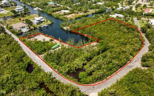 PRIME 11.4-ACRE DEVELOPMENT OPPORTUNITY WITH BOAT HOUSE POTENTIAL IN DESIRABLE RED BAY, HERON BAY