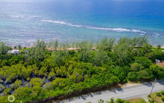 TRANQUIL BEACHFRONT ACRE PARCEL- REEF PROTECTED WITH WHITE SAND