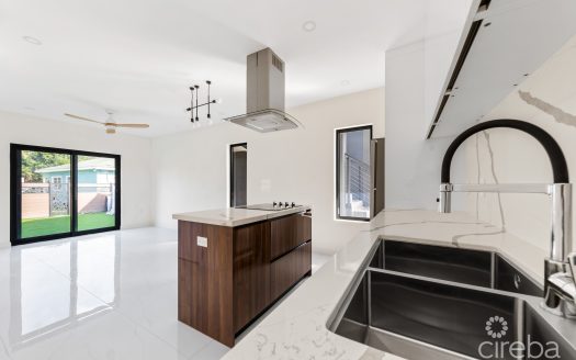 ARZA WEST BAY F1 . 2 BED + DEN END UNIT, PRIVATE PATIO. INCLUSIVE OF CI$ 17,000 FURNITURE PACKAGE