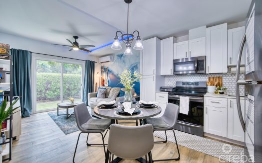 LIGHTHOUSE MANOR #6- CHIC 1-BEDROOM TOWNHOME IN GATED WEST BAY COMMUNITY