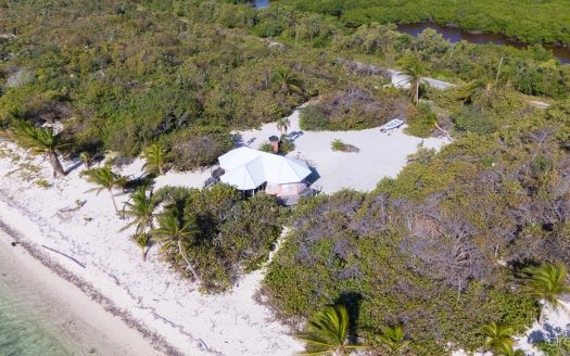 LITTLE CAYMAN LAND WITH BEACHFRONT COTTAGE