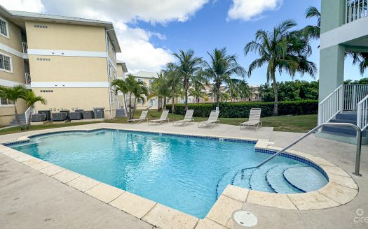 LAKESIDE CONDO NEAR CAMANA BAY