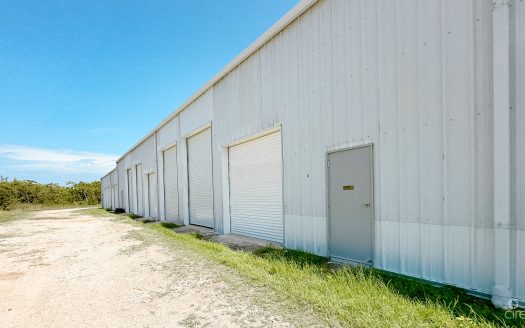LITTLE CAYMAN WAREHOUSE (20 UNITS) AND LAND SUB-DIVISION  13 LOTS