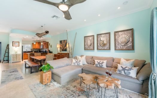 UPGRADED COASTAL ESCAPE CANAL FRONT TOWNHOUSE