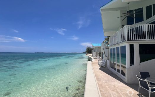 CAYMAN REEF RESORT BEACHFRONT WITH FUTURE REDEVELOPMENT