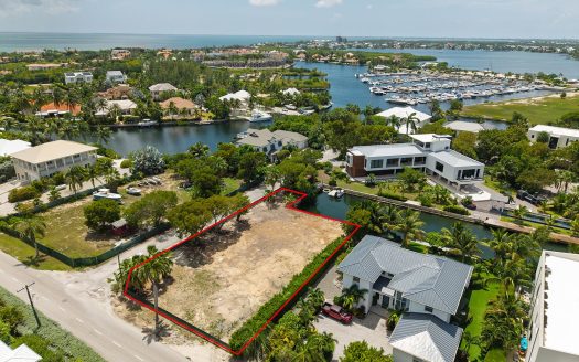 RARE CORNER WATERFRONT PARCEL IN THE YACHT CLUB