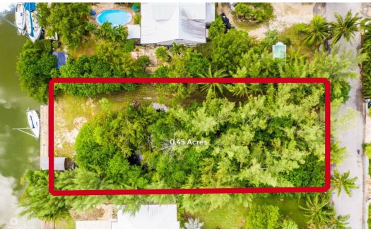 CANAL FRONT .45ACRE RED BAY