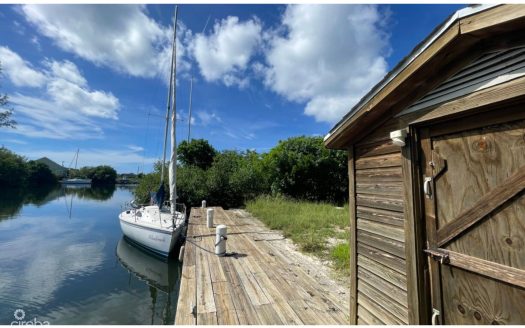 CANAL FRONT .45ACRE RED BAY