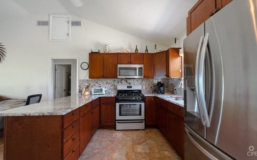 LITTLE CAYMAN OCEAN VIEW RESIDENTIAL HOME WITH BEACHFRONT LOT