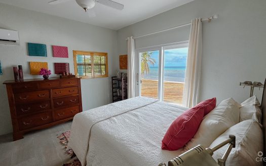 LITTLE CAYMAN BEACHFRONT HOME WITH 2 LOTS AND POOL