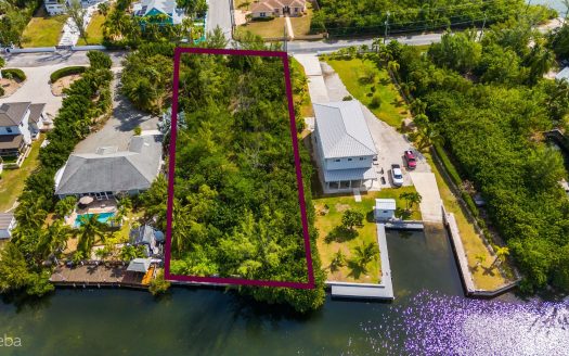 RED BAY WOODSTOCK DR OVERSIZED CANAL FRONT LOT