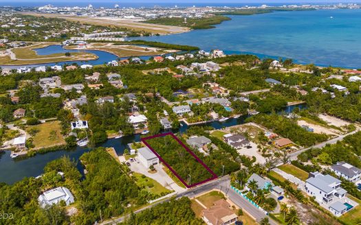 RED BAY WOODSTOCK DR OVERSIZED CANAL FRONT LOT