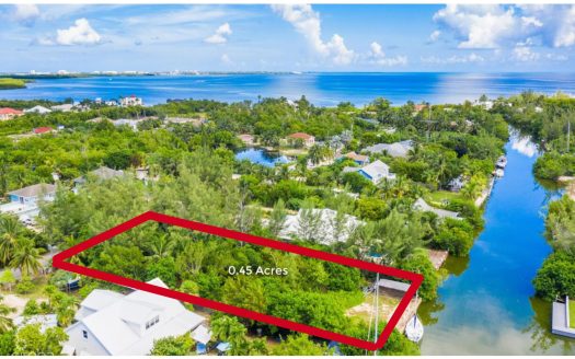 CANAL FRONT .45ACRE RED BAY