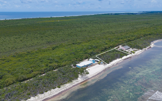 LITTLE CAYMAN BEACHFRONT HOME WITH 2 LOTS AND POOL