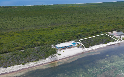 LITTLE CAYMAN BEACHFRONT HOME WITH 2 LOTS AND POOL