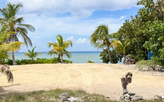 LITTLE CAYMAN OCEAN VIEW RESIDENTIAL HOME WITH BEACHFRONT LOT