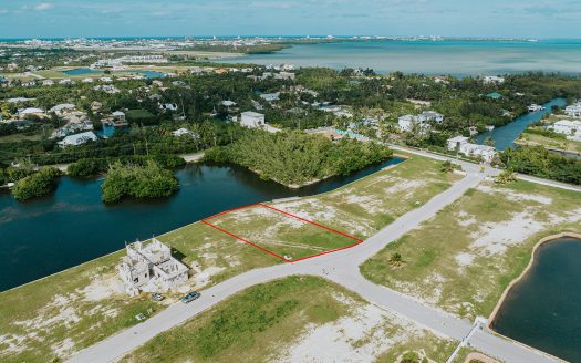 LARGEST LOT IN MUSTIQUE COVE – 0.31 ACRE CANAL LOT