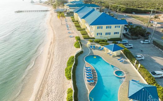 CASTAWAY COVE | 2-BED BEACHFRONT CONDO – QUARTER SHARE WITH INCOME POTENTIAL