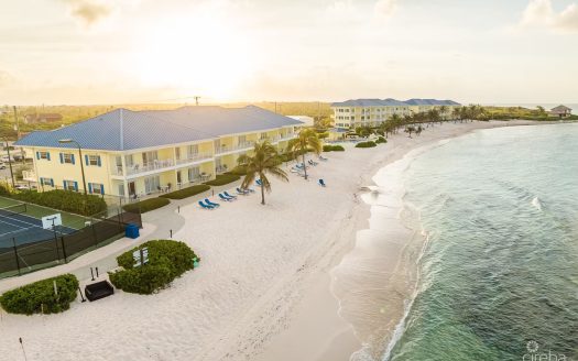 CASTAWAY COVE | 2-BED BEACHFRONT CONDO – QUARTER SHARE WITH INCOME POTENTIAL