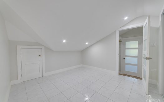 ELEVATED, 6-BEDROOM SINGLE FAMILY HOME ON A MASSIVE PARCEL