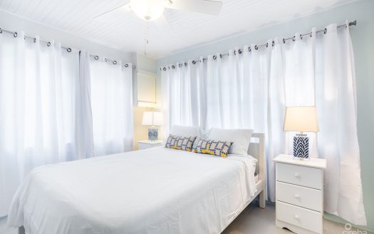 CHARMING OCEANVIEW COTTAGE ACROSS FROM THE SEA ON EXPANSIVE 0.89 ACRE LOT