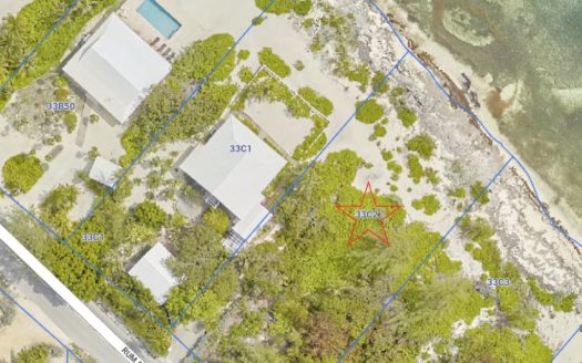 RUM POINT BEACHFRONT LOT WITH CORAL REEF