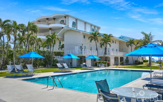 CAYMAN REEF RESORT BEACHFRONT WITH FUTURE REDEVELOPMENT
