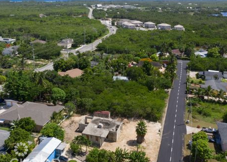 NORTH SIDE DEVELOPMENT LOT WITH PARTIAL CONSTRUCTION & PLANS