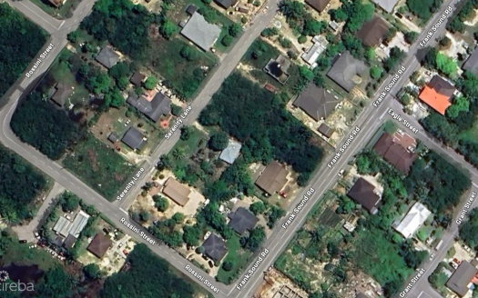 NORTH SIDE DEVELOPMENT LOT WITH PARTIAL CONSTRUCTION & PLANS