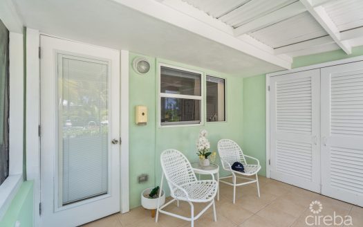 CAYMAN KAI SEA LODGE #13 BEACHFRONT CONDO WITH IMPRESSIVE RENTAL HISTORY