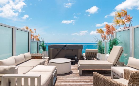 THREE-LEVEL OCEANFRONT FIN PENTHOUSE #30 PLUS 2 GARAGES