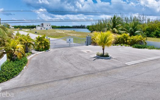 MUSTIQUE COVE LOT WITH DOCK IN A PRIVATE GATED COMMUNITY