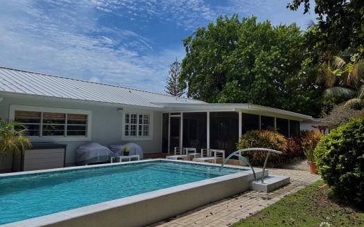 RARE DOUBLE-LOT OASIS BUNGALOW WITH POOL IN SNUG HARBOUR