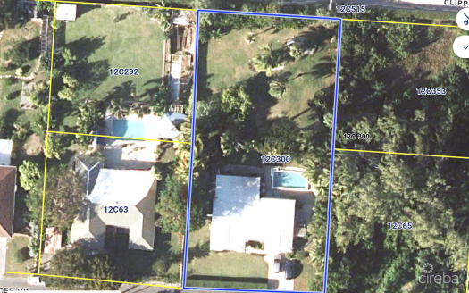 RARE DOUBLE-LOT OASIS BUNGALOW WITH POOL IN SNUG HARBOUR