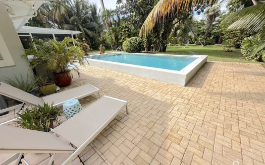 RARE DOUBLE-LOT OASIS BUNGALOW WITH POOL IN SNUG HARBOUR
