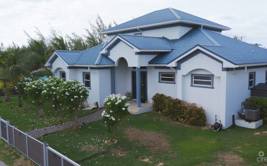 SUN ROSE CANAL FRONT HOME – NORTH SOUND ESTATES